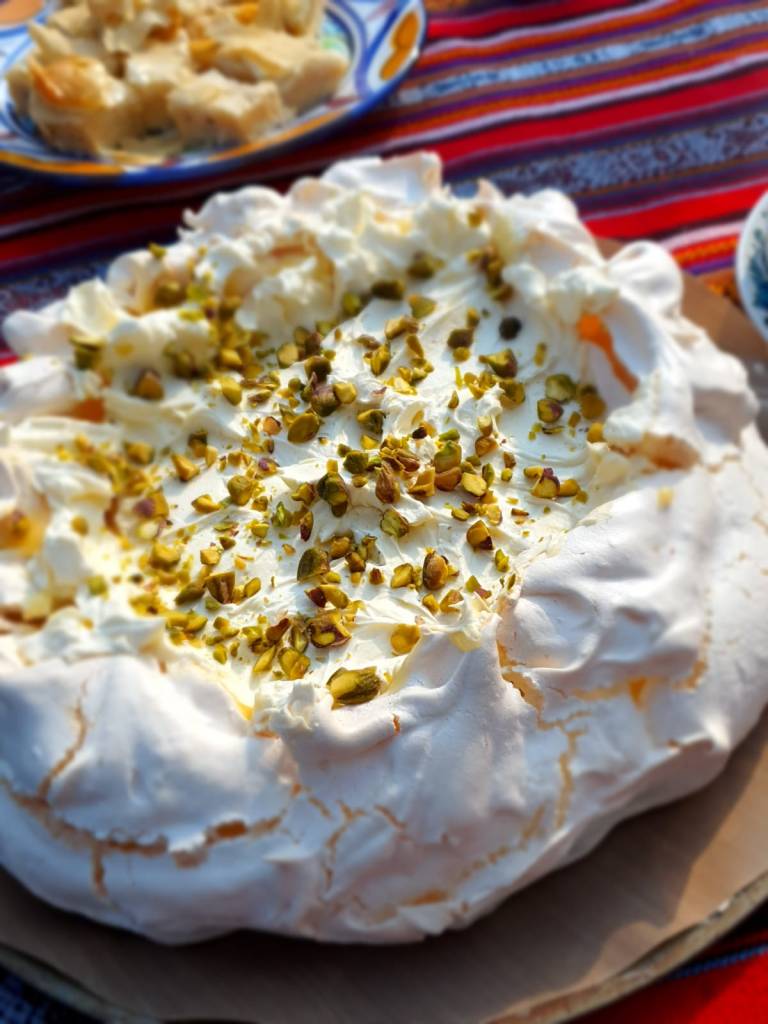 A lemon curd pavlova with pistachios