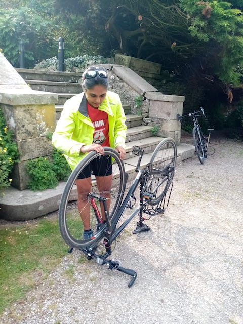 Me inspecting my bike wheel