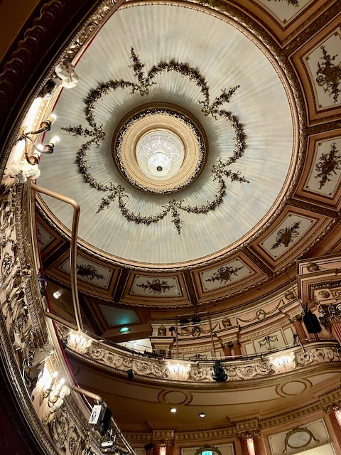 The interior of The Gielgud Theatre, looking up at the ceiling 