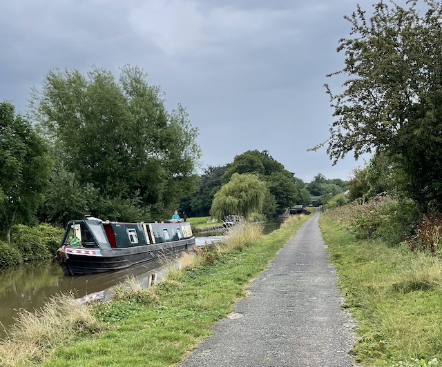 A canal boat chugging slowly up the canal