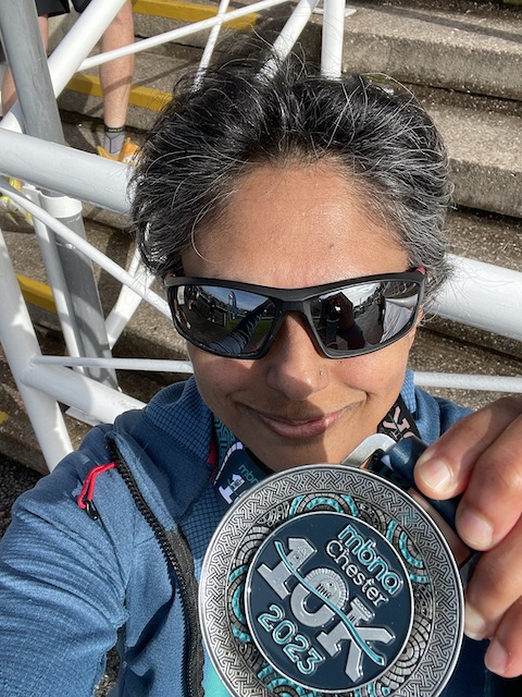 A selfie of me with my finisher's medal.