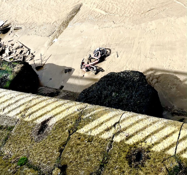 A bike on the beach abandoned