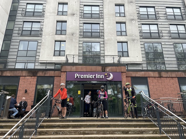 Premier Inn front at Shrewsbury. Steps in foreground and cyclists at top of steps.