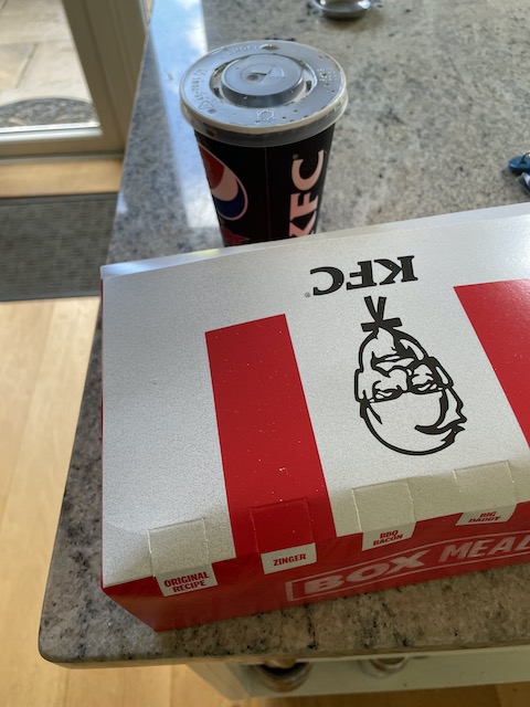 A box of KFC and a drink.