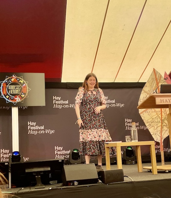 Jean Menzies on stage by herself