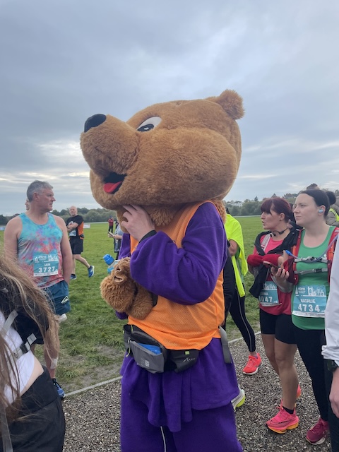 The fancy dress bear limbering up.