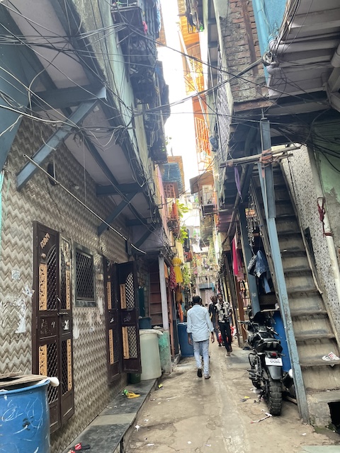 Another narrow street with a stairwell