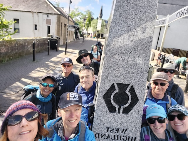 All of us at the start of the walk, by the obelisk in Milngavie.