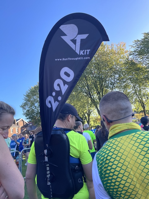 A pacer with the 2:20 flag alongside a few other runners ahead of me.