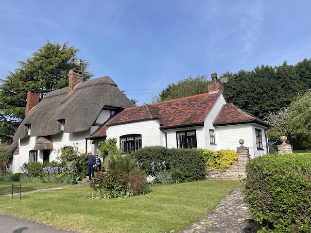 Thatched house and lovely garden that we went past